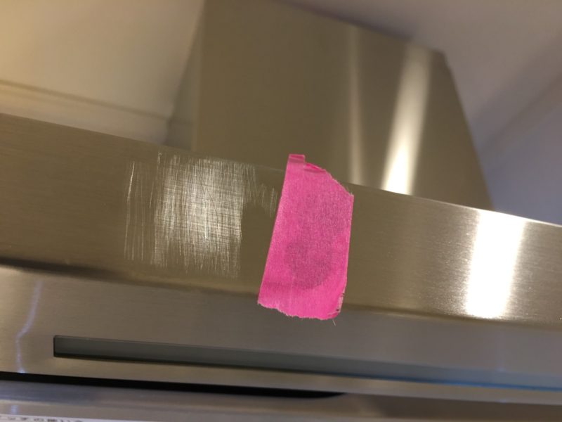 18-22  レンジフード傷補修